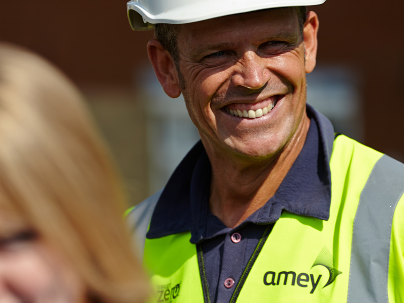 Male Amey employee, wearing PPE.