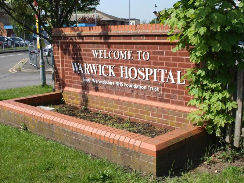Image of 'Welcome to Warwick Hospital' welcome sign.