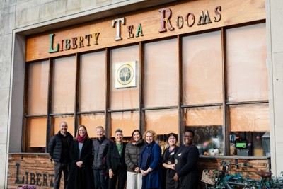 Amey employees stood in front of Liberty Tea Rooms