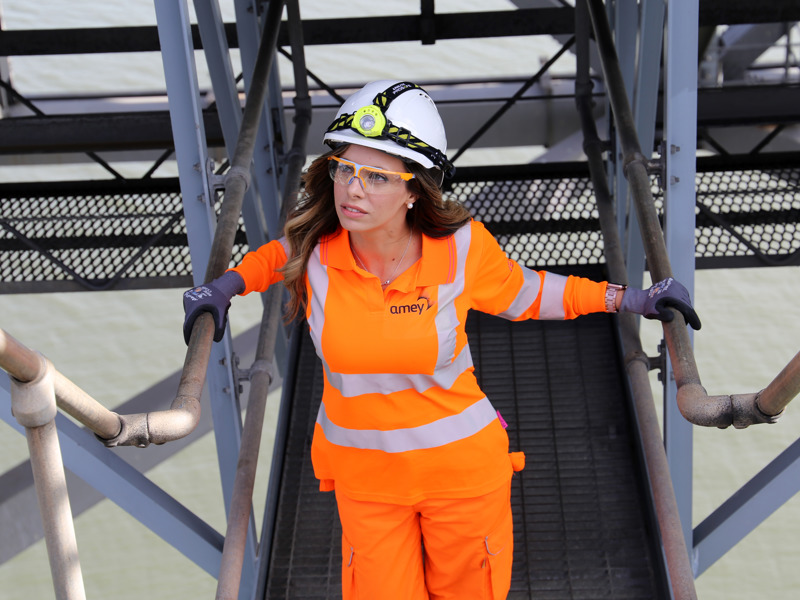 A woman in PPE.