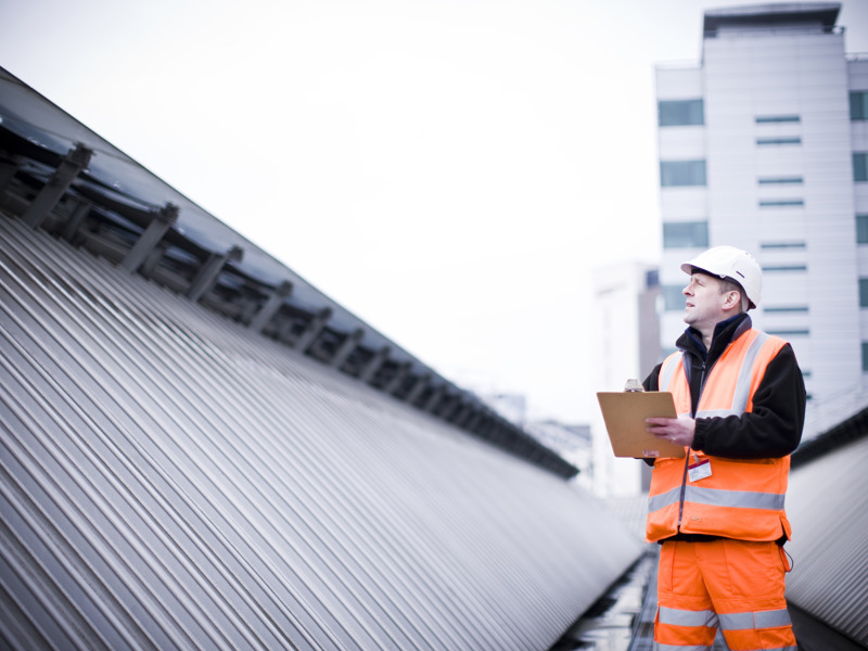 Image of an Amey employee carrying out an inspection.