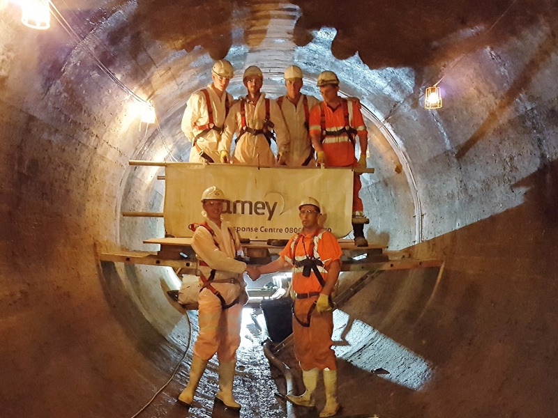 Amey workers, in a tunnel.