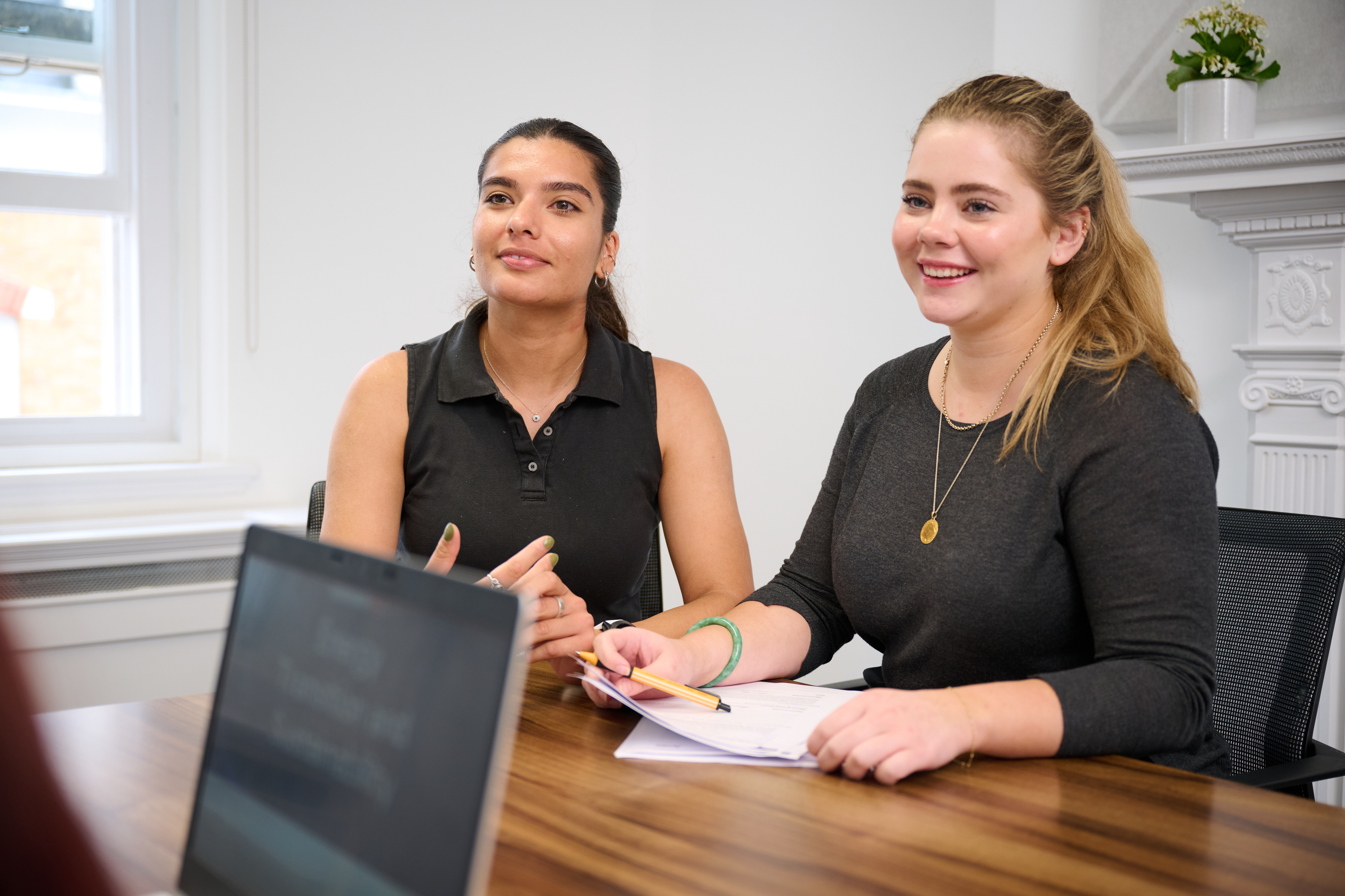 Image of two Amey employees in an office environment