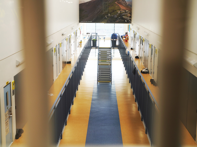 Hallway image of a prison.