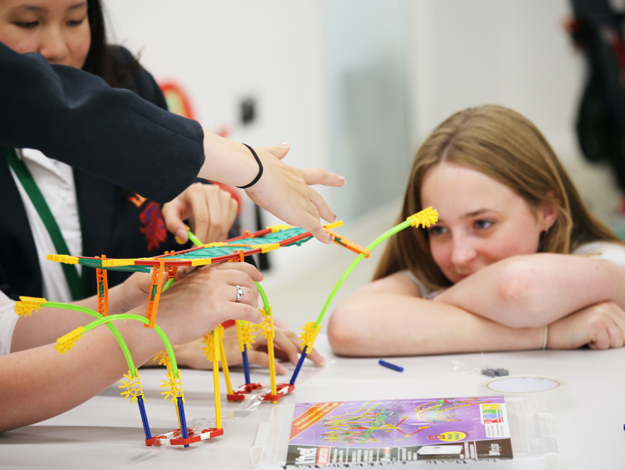 Image of children experimenting with STEM toys