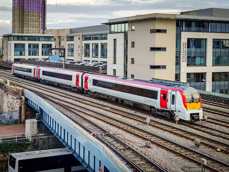Image of a train in front of a building
