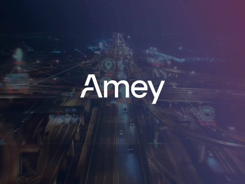 Amey logo over a cityscape background.