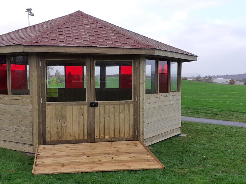 Image of a wooden outdoors project classroom.