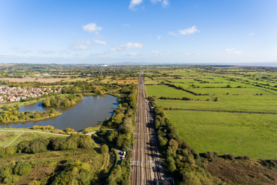 Ariel image of a rail track in the country side.