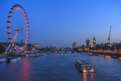 Image of the river Thames at night, showing the London Eye