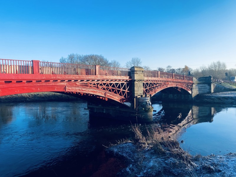 Image of a foot bridge over water.