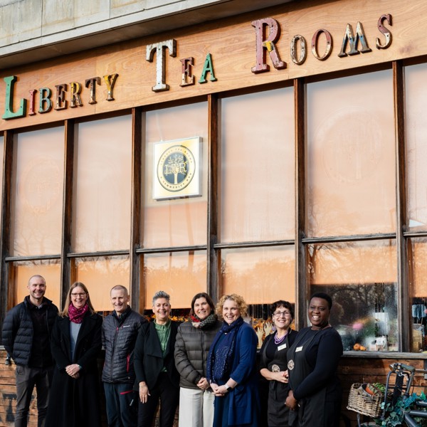 Amey employees stood in front of Liberty Tea Rooms